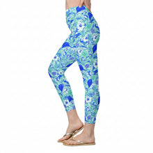 Load image into Gallery viewer, Women’s leggings in blue tropical sportfish print with sailfish, mahi, hibiscus flowers, and ocean wave design
Blue and seafoam fishing-inspired leggings featuring sailfish, mahi mahi, coral, and tropical floral pattern